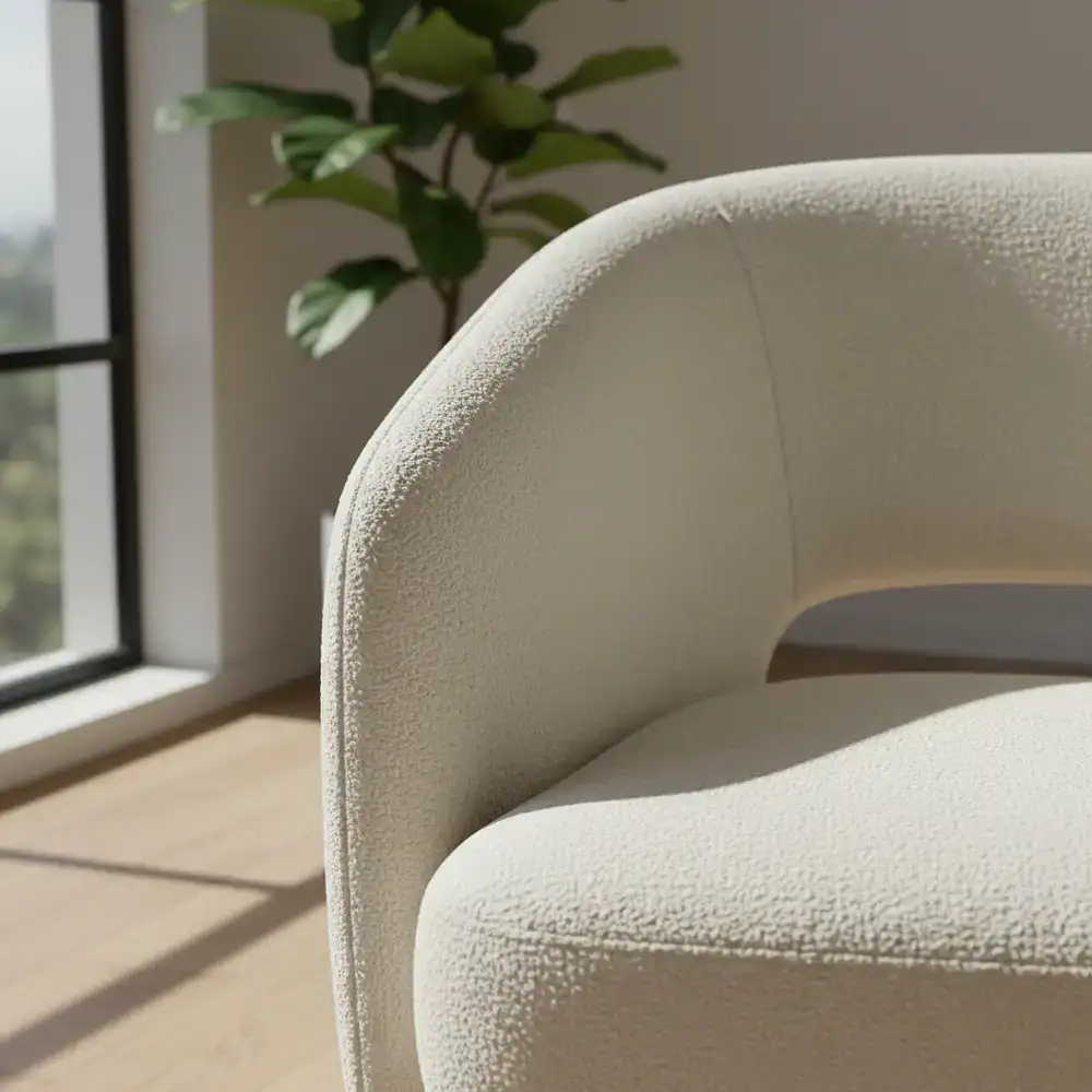 Close up of a bouclé fabric armchair